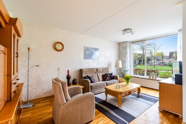 Foto - Te koop: tussenwoning gelegen aan groenvoorziening